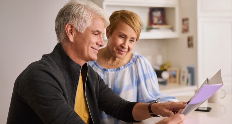 A man and woman looking at MVP resources.